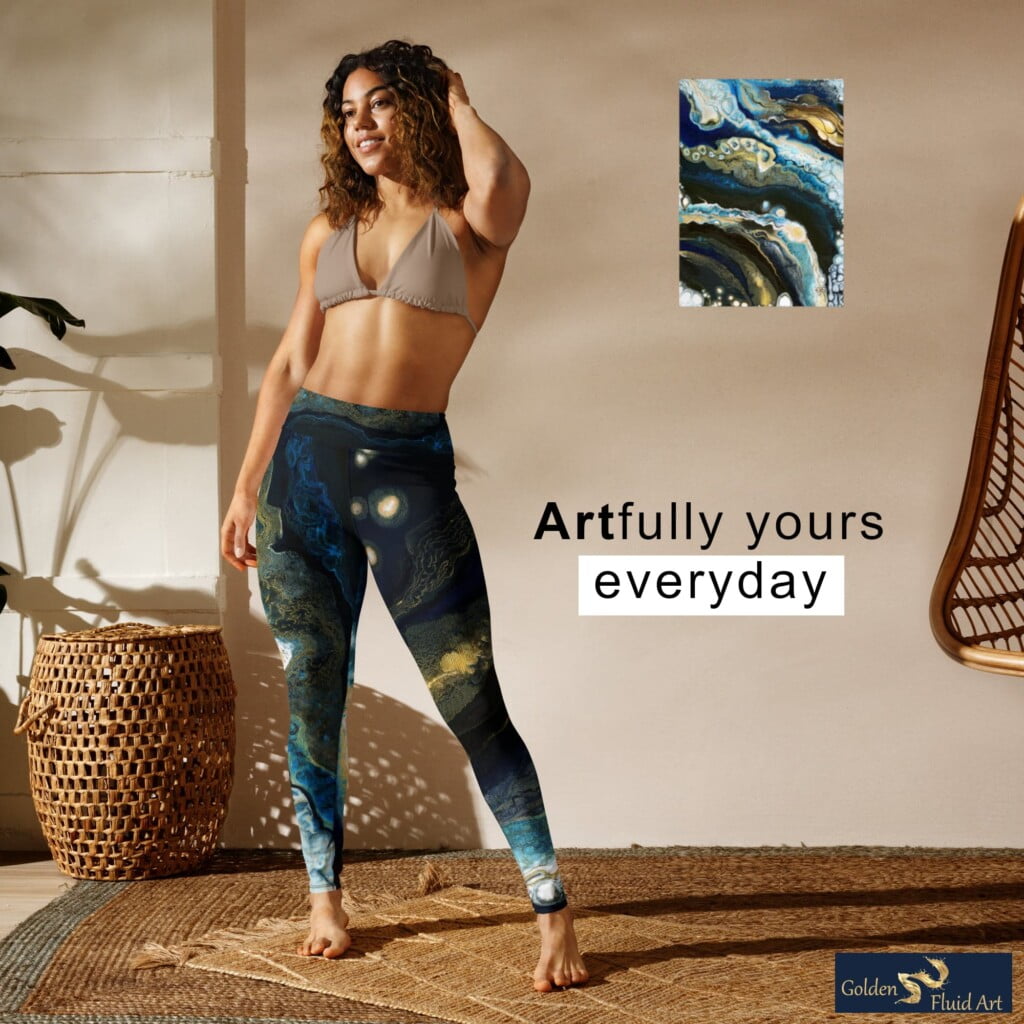 woman wearing Blue Lagoon leggings with Blue Lagoon painting hanging in the background