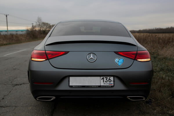 electric blue sticker on a car bumper